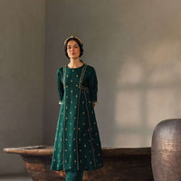 A-line kurta set in dark green with embroidery for festive wear in india