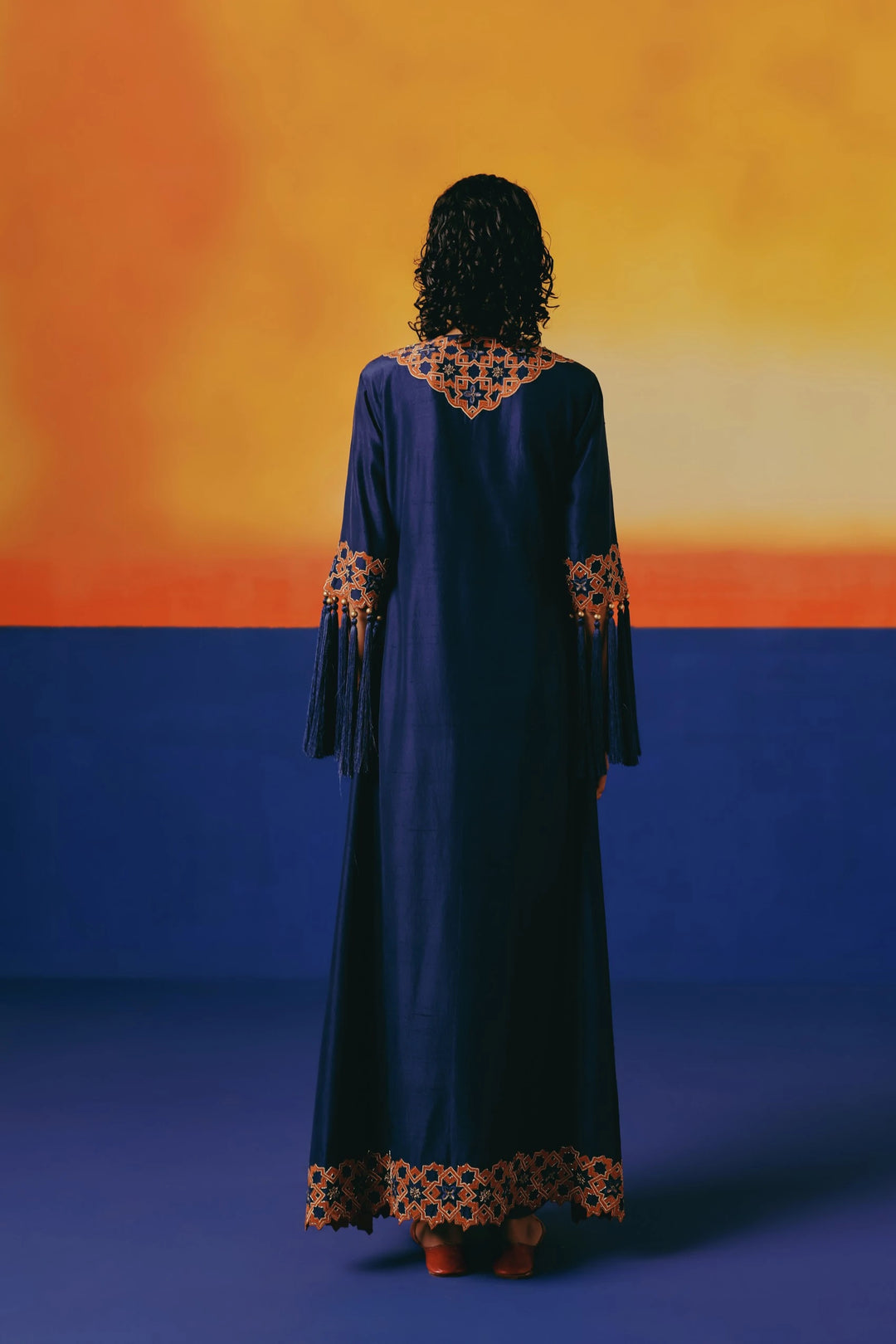 Back view of Warra's navy & orange silk kaftan 