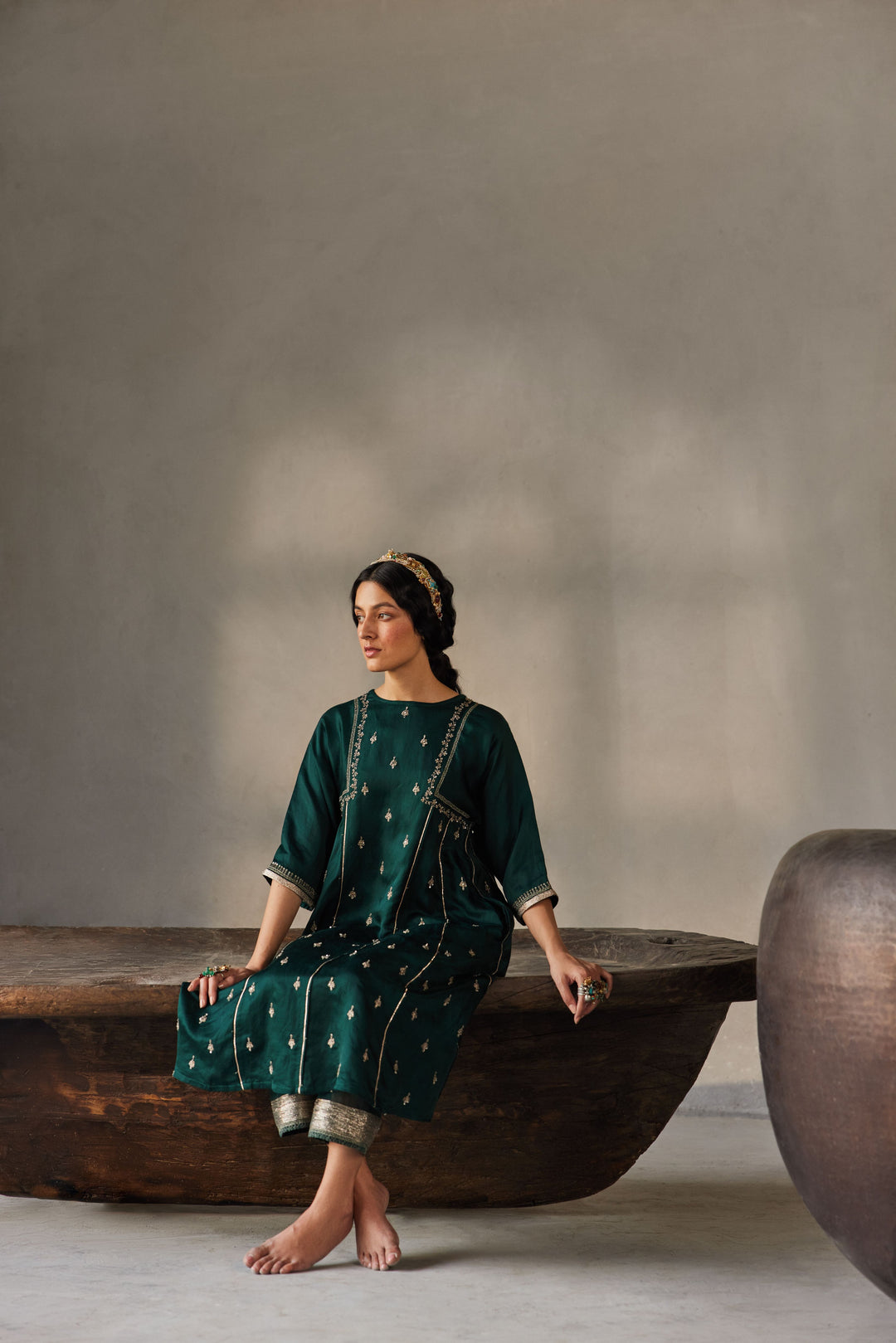 A-line kurta set in green with embroidery for festive wear india - seated view